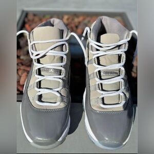 Air Jordan’s 11’s retro cool grey